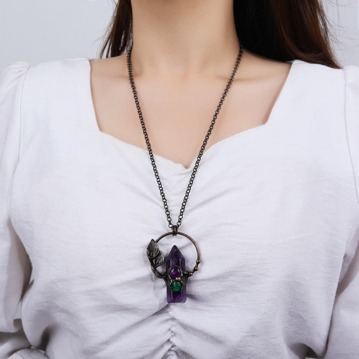 Collier avec pendentif en forme de balle en pierre naturelle Olivenorma