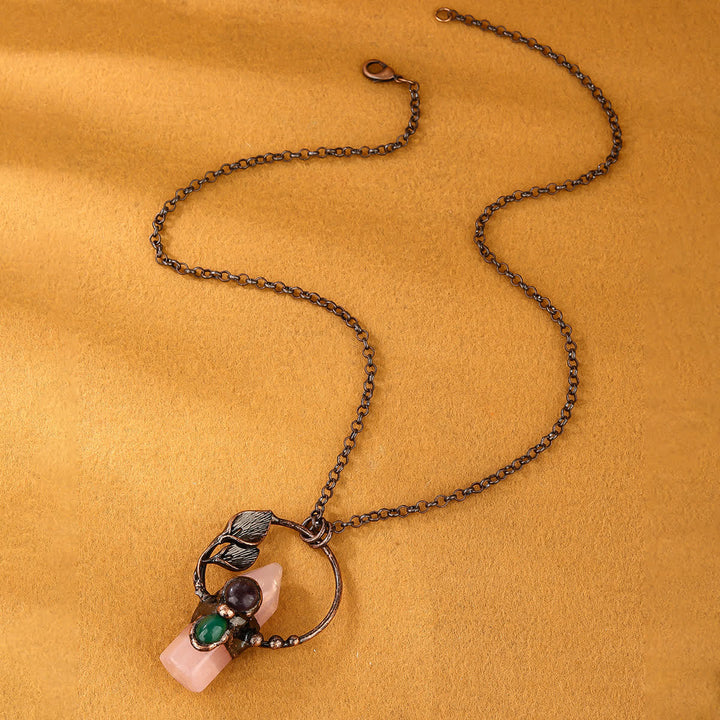Collier avec pendentif en forme de balle en pierre naturelle Olivenorma