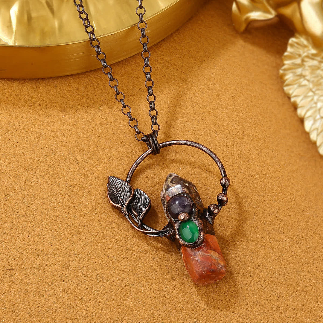Collier avec pendentif en forme de balle en pierre naturelle Olivenorma