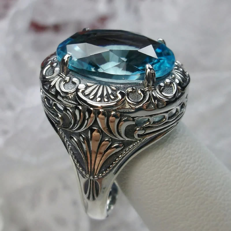 Bague rétro Olivenorma avec pierre précieuse sculptée à facettes aigue-marine