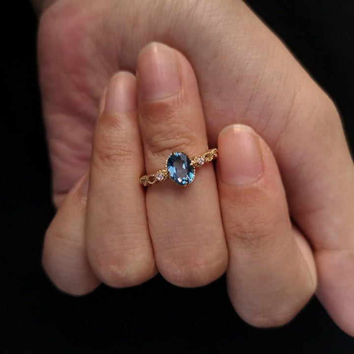 Bague olivenorma vintage avec topaze bleue ovale