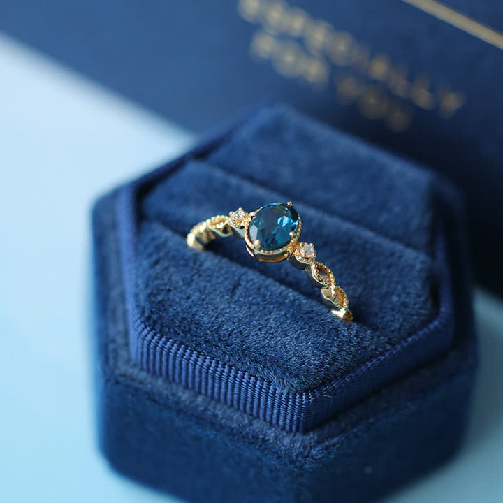 Bague olivenorma vintage avec topaze bleue ovale