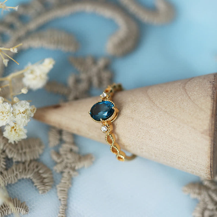 Bague olivenorma vintage avec topaze bleue ovale