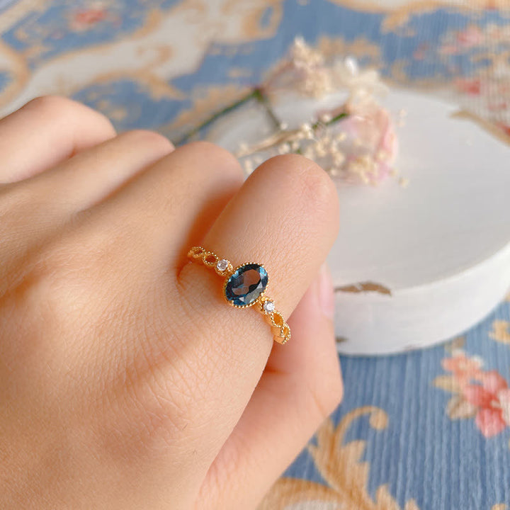 Bague olivenorma vintage avec topaze bleue ovale
