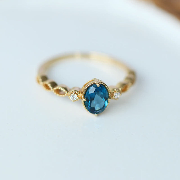 Bague olivenorma vintage avec topaze bleue ovale