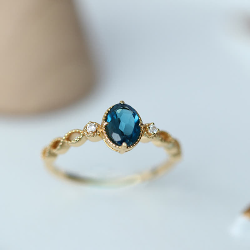 Bague olivenorma vintage avec topaze bleue ovale