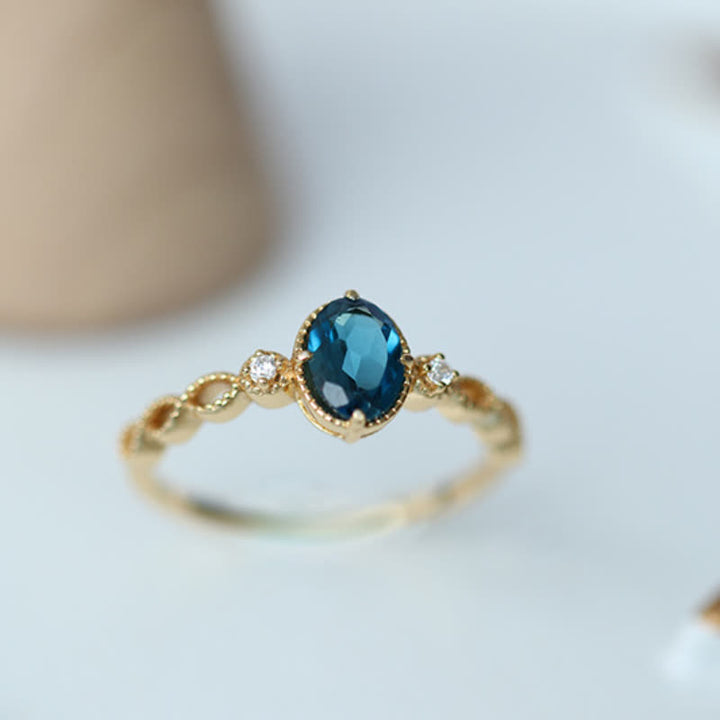 Bague olivenorma vintage avec topaze bleue ovale