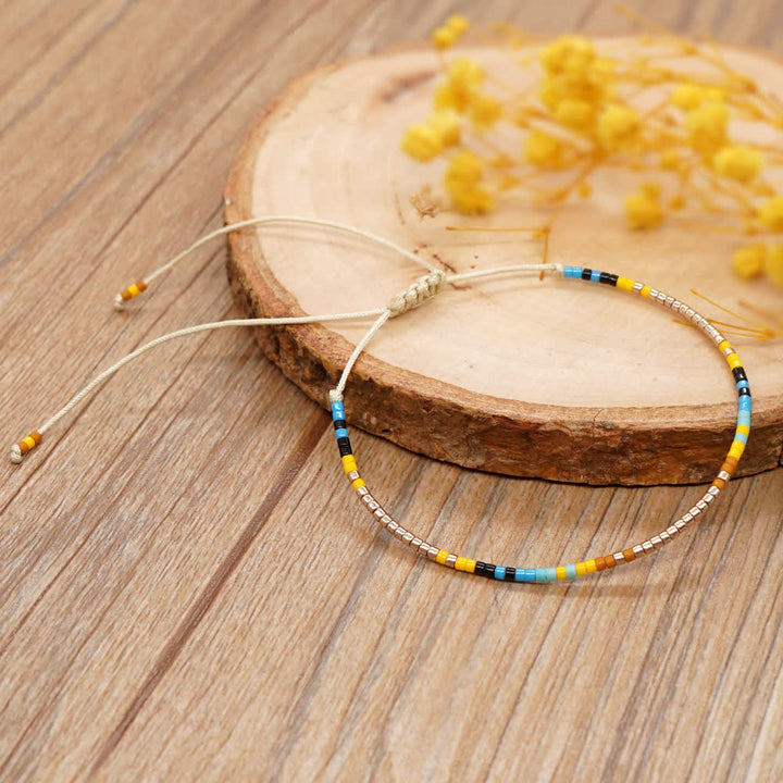 Bracelet ajustable en perles métalliques de riz colorées Olivenorma