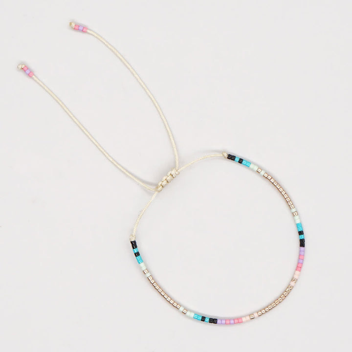 Bracelet ajustable en perles métalliques de riz colorées Olivenorma