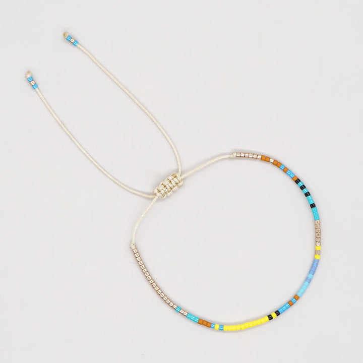 Bracelet ajustable en perles métalliques de riz colorées Olivenorma