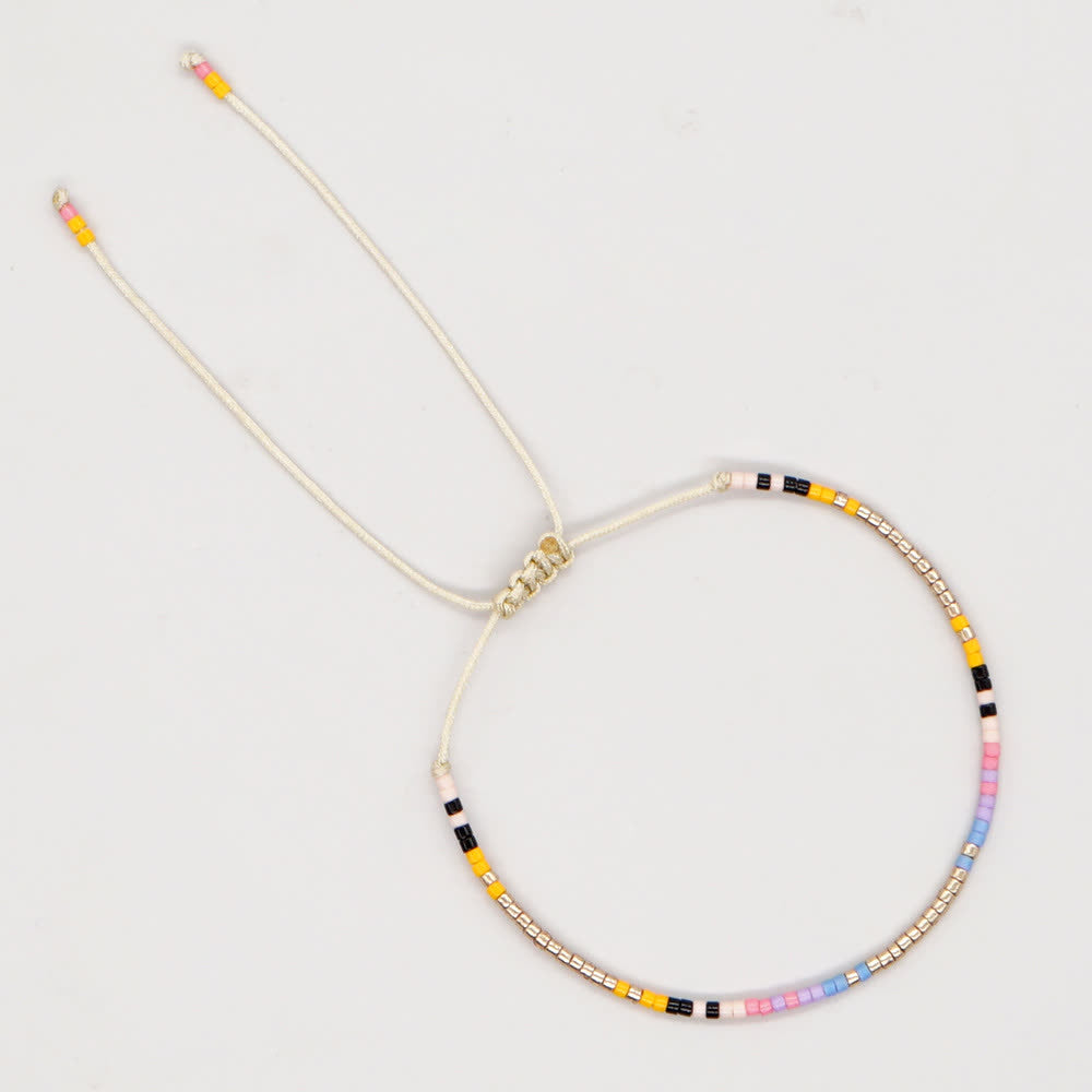 Bracelet ajustable en perles métalliques de riz colorées Olivenorma
