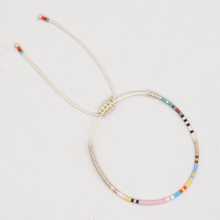 Bracelet ajustable en perles métalliques de riz colorées Olivenorma
