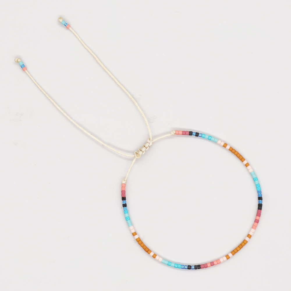 Bracelet ajustable en perles métalliques de riz colorées Olivenorma