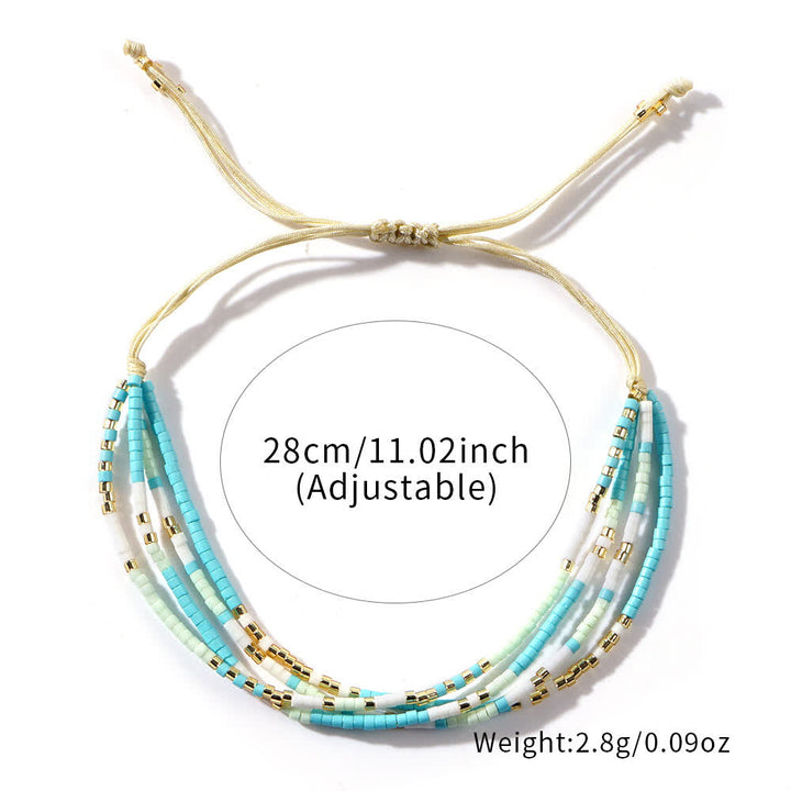 Bracelet de plage tressé en perles de riz bleu et blanc Olivenorma