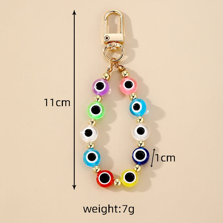 Porte-clés en perles à suspendre avec symbole du mauvais œil Olivenorma