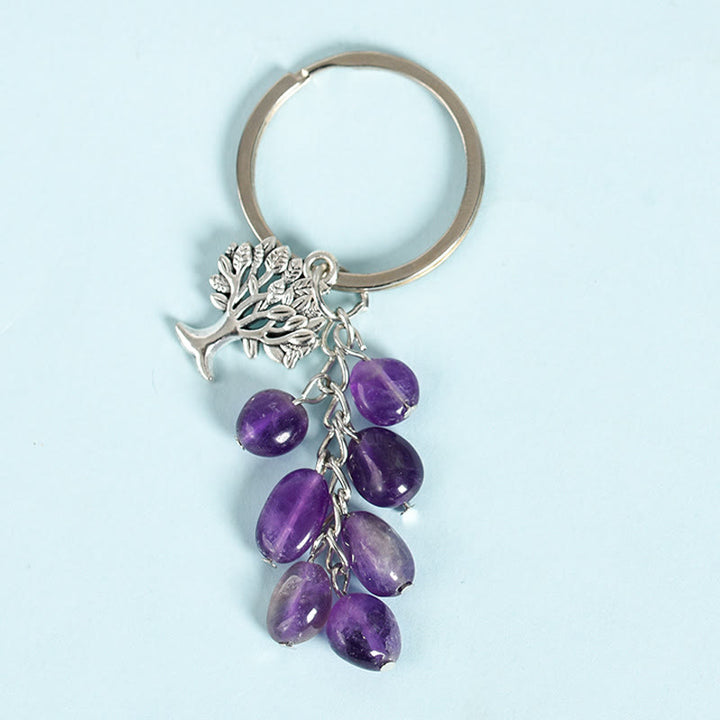 Porte-clés en pierre naturelle brute Olivenorma avec arbre de vie