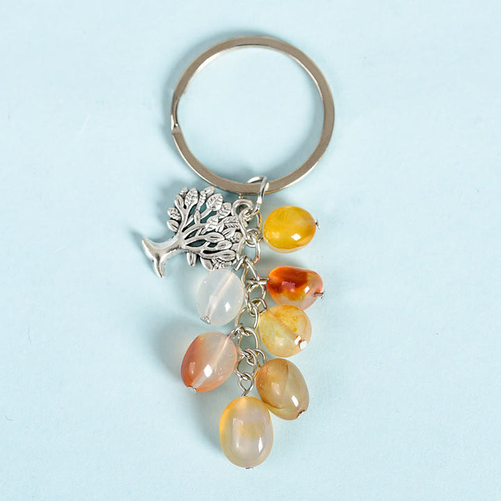 Porte-clés en pierre naturelle brute Olivenorma avec arbre de vie