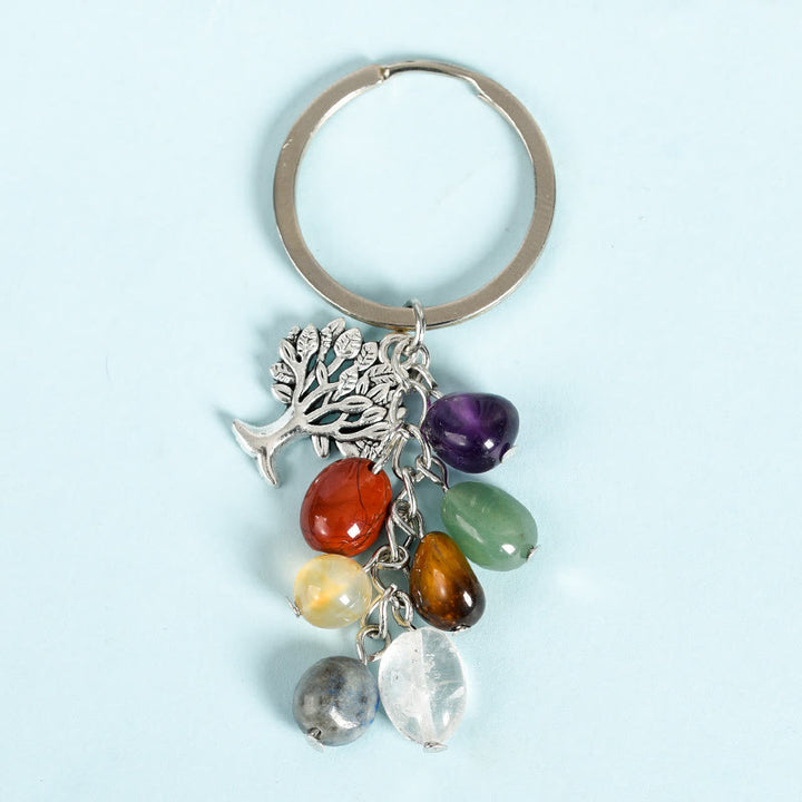 Porte-clés en pierre naturelle brute Olivenorma avec arbre de vie