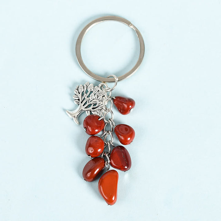 Porte-clés en pierre naturelle brute Olivenorma avec arbre de vie