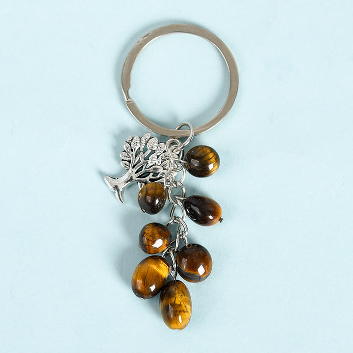 Porte-clés en pierre naturelle brute Olivenorma avec arbre de vie