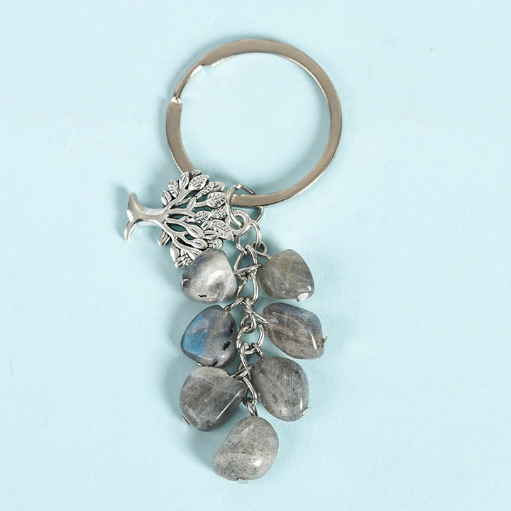 Porte-clés en pierre naturelle brute Olivenorma avec arbre de vie