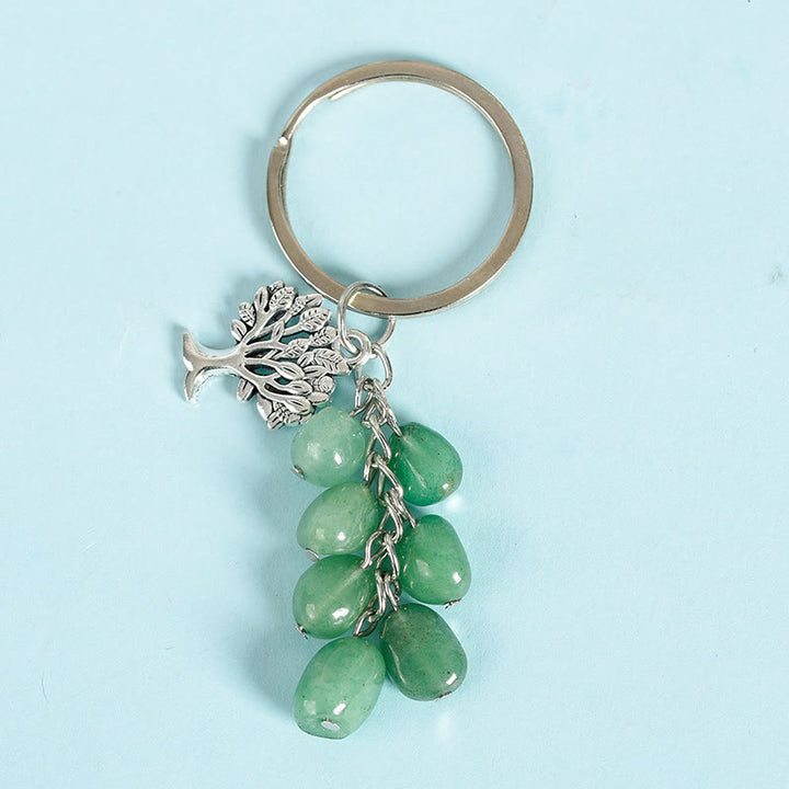 Porte-clés en pierre naturelle brute Olivenorma avec arbre de vie