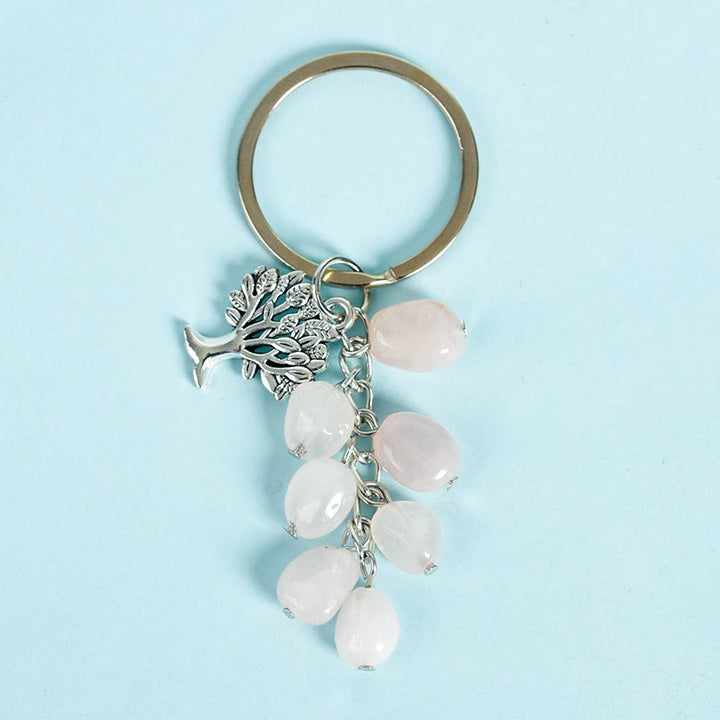 Porte-clés en pierre naturelle brute Olivenorma avec arbre de vie