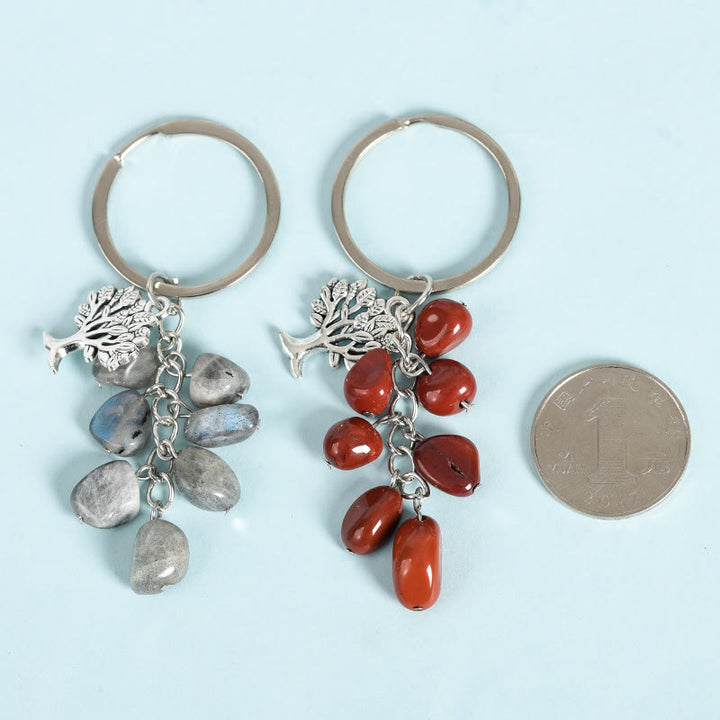 Porte-clés en pierre naturelle brute Olivenorma avec arbre de vie