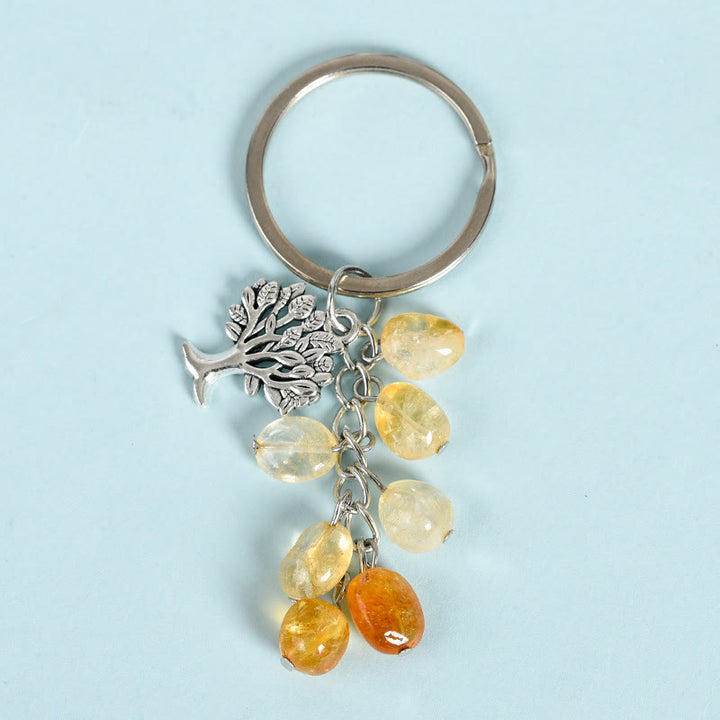 Porte-clés en pierre naturelle brute Olivenorma avec arbre de vie
