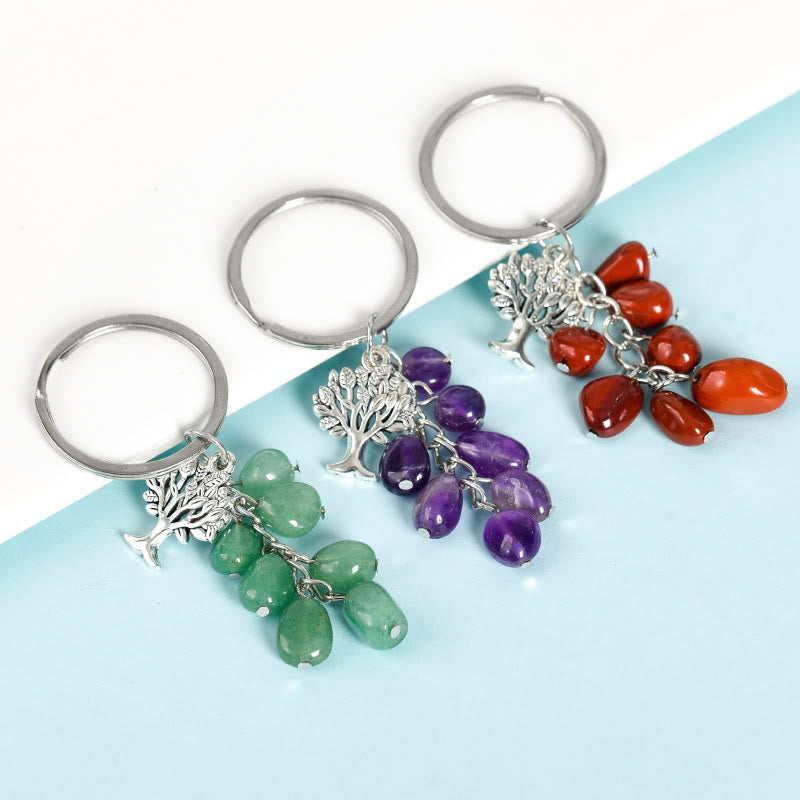 Porte-clés en pierre naturelle brute Olivenorma avec arbre de vie