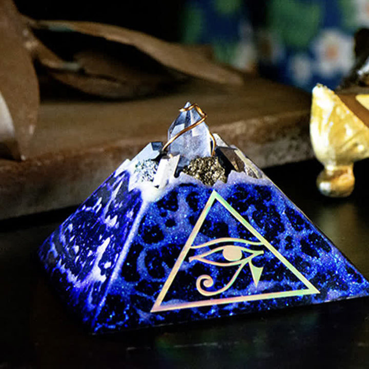 Pyramide d'orgone de flèche d'énergie de cristal d'Olivenorma Œil d'Horus