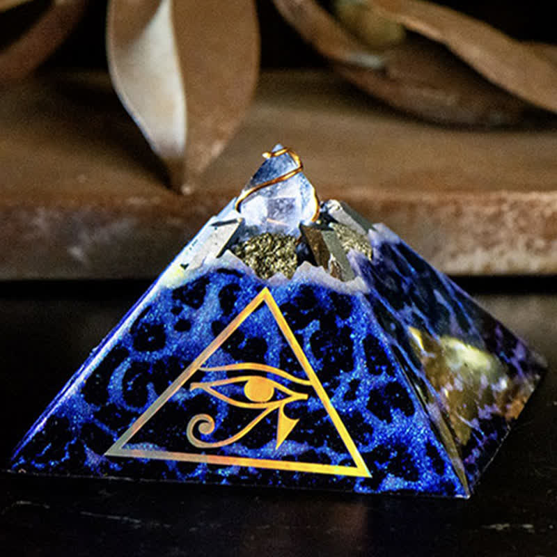 Pyramide d'orgone de flèche d'énergie de cristal d'Olivenorma Œil d'Horus