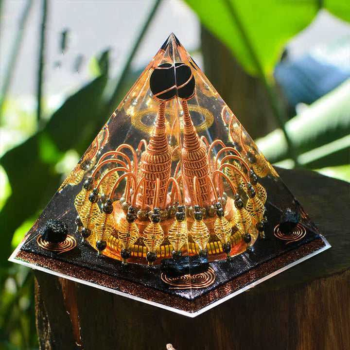 Pyramide d'orgone en cristal noir Olivenorma « Seigneur de la nuit noire dorée »
