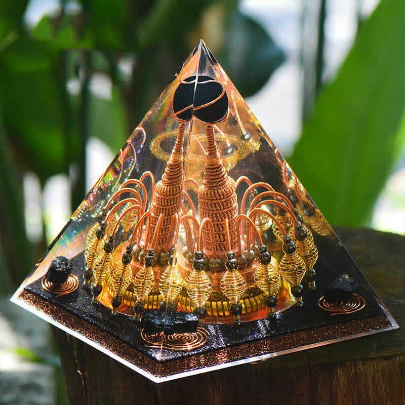 Pyramide d'orgone en cristal noir Olivenorma « Seigneur de la nuit noire dorée »