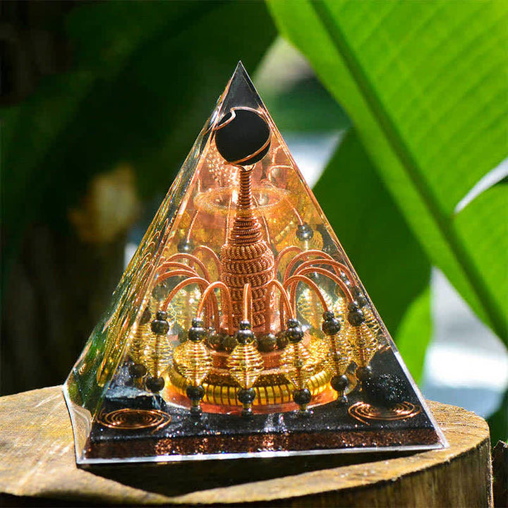 Pyramide d'orgone en cristal noir Olivenorma « Seigneur de la nuit noire dorée »