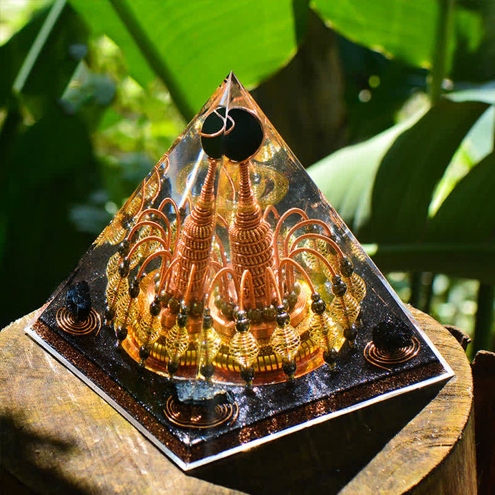 Pyramide d'orgone en cristal noir Olivenorma « Seigneur de la nuit noire dorée »