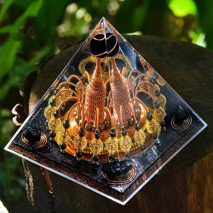 Pyramide d'orgone en cristal noir Olivenorma « Seigneur de la nuit noire dorée »