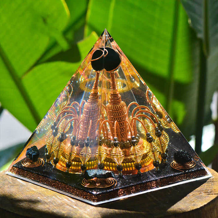 Pyramide d'orgone en cristal noir Olivenorma « Seigneur de la nuit noire dorée »