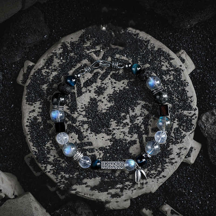 Bracelet en perles d'œil de tigre bleu en pierre de lune Olivenorma