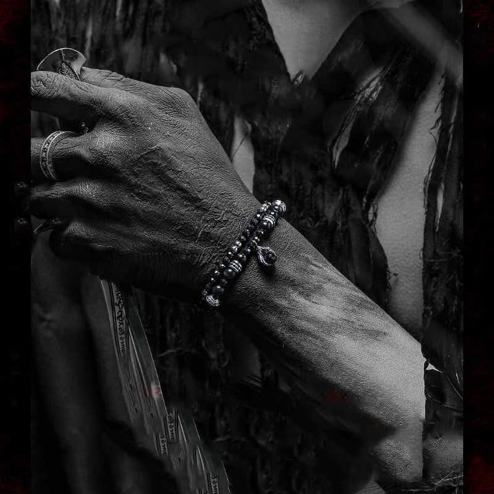 Bracelet pendentif en forme de griffe du diable avec perles d'obsidienne argentée Olivenorma