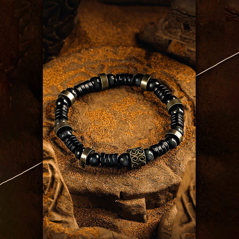 Bracelet en perles de noix de coco en obsidienne argentée Olivenorma