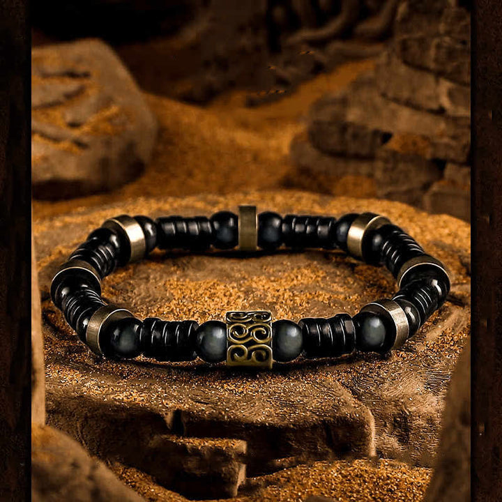 Bracelet en perles de noix de coco en obsidienne argentée Olivenorma
