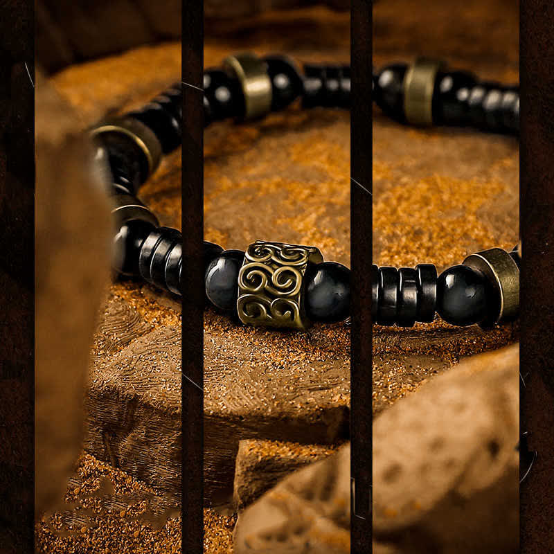 Bracelet en perles de noix de coco en obsidienne argentée Olivenorma