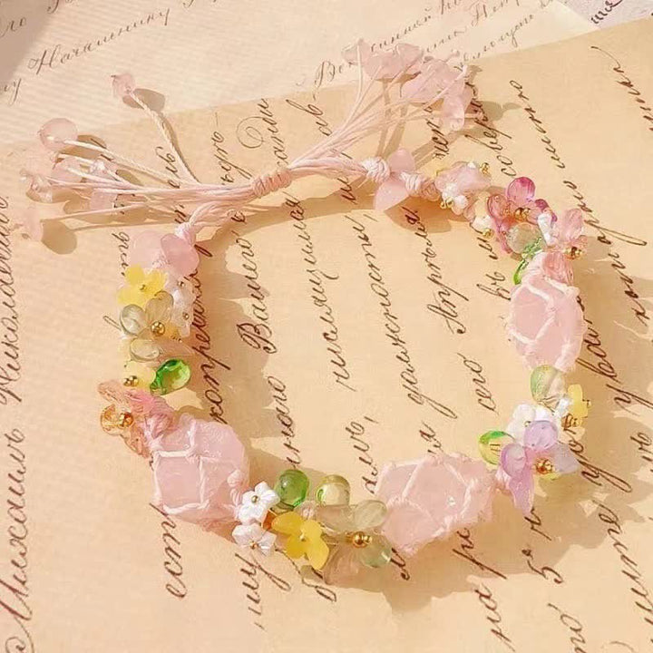 Bracelet tressé à fleurs en quartz rose fabriqué à la main par Olivenorma