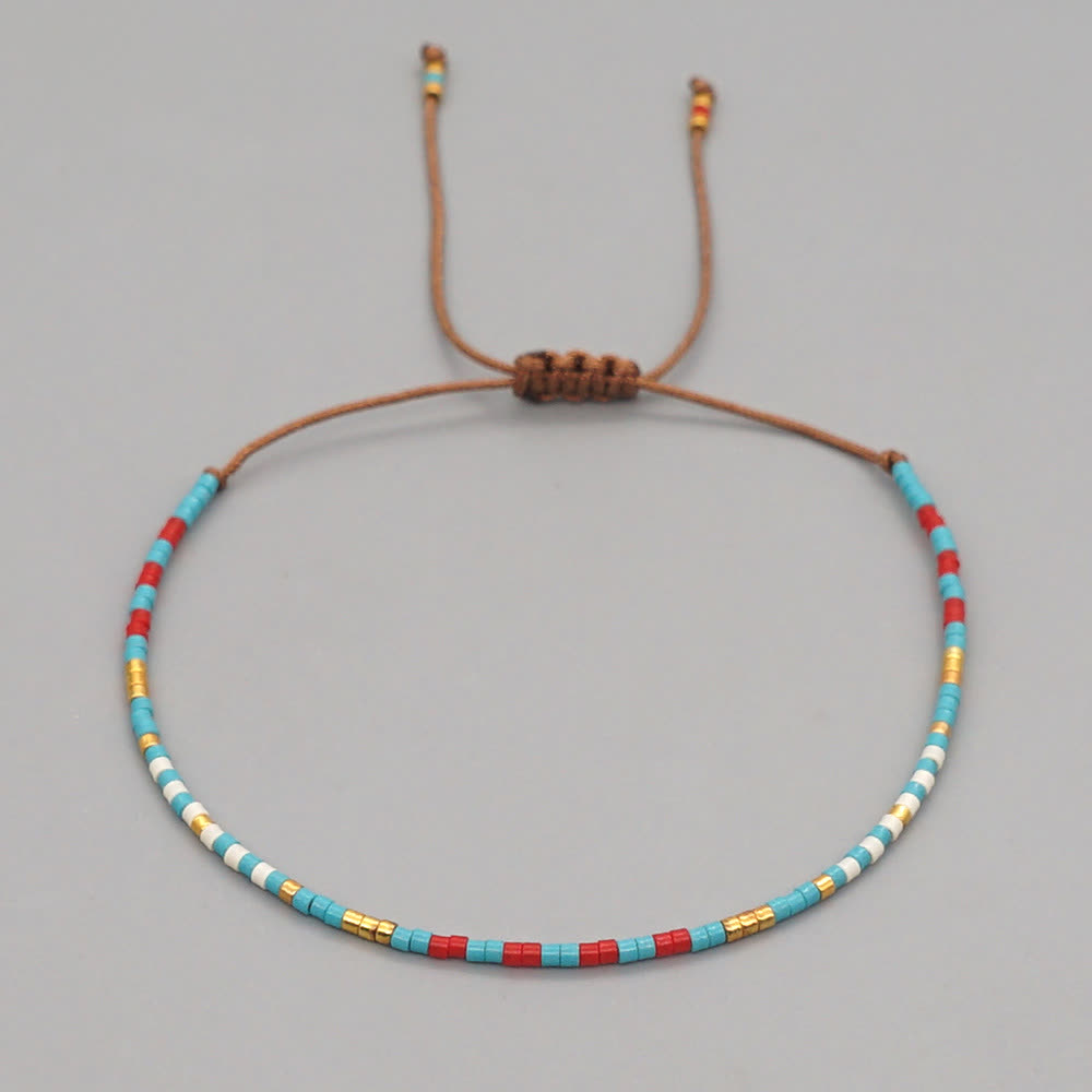 Bracelet tressé marron en perles de riz colorées Olivenorma