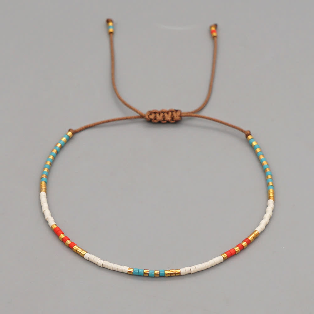 Bracelet tressé marron en perles de riz colorées Olivenorma