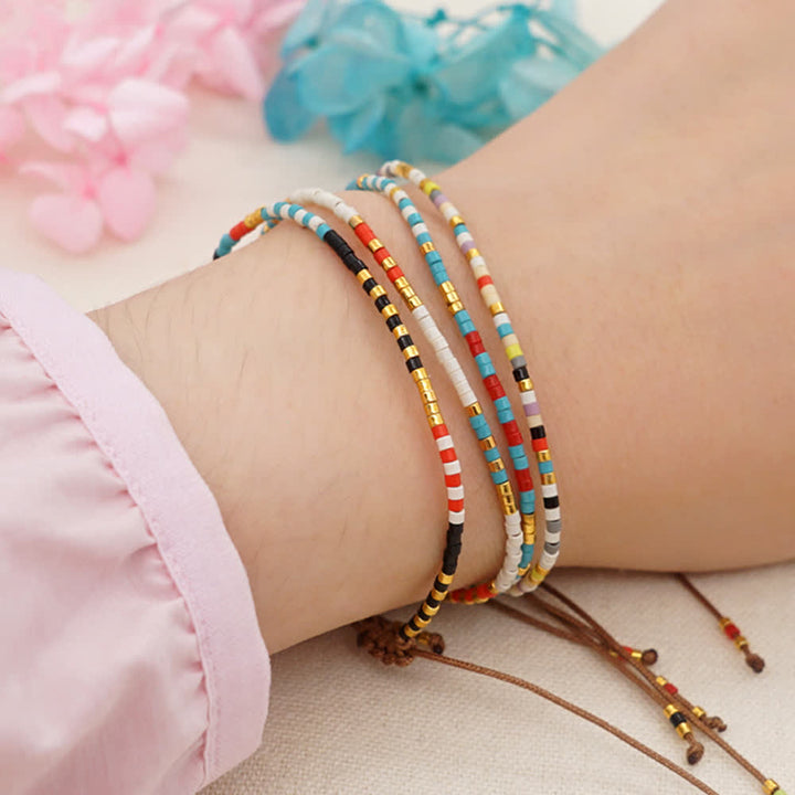 Bracelet tressé marron en perles de riz colorées Olivenorma