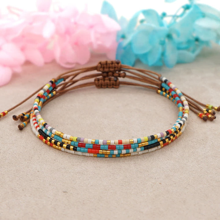 Bracelet tressé marron en perles de riz colorées Olivenorma
