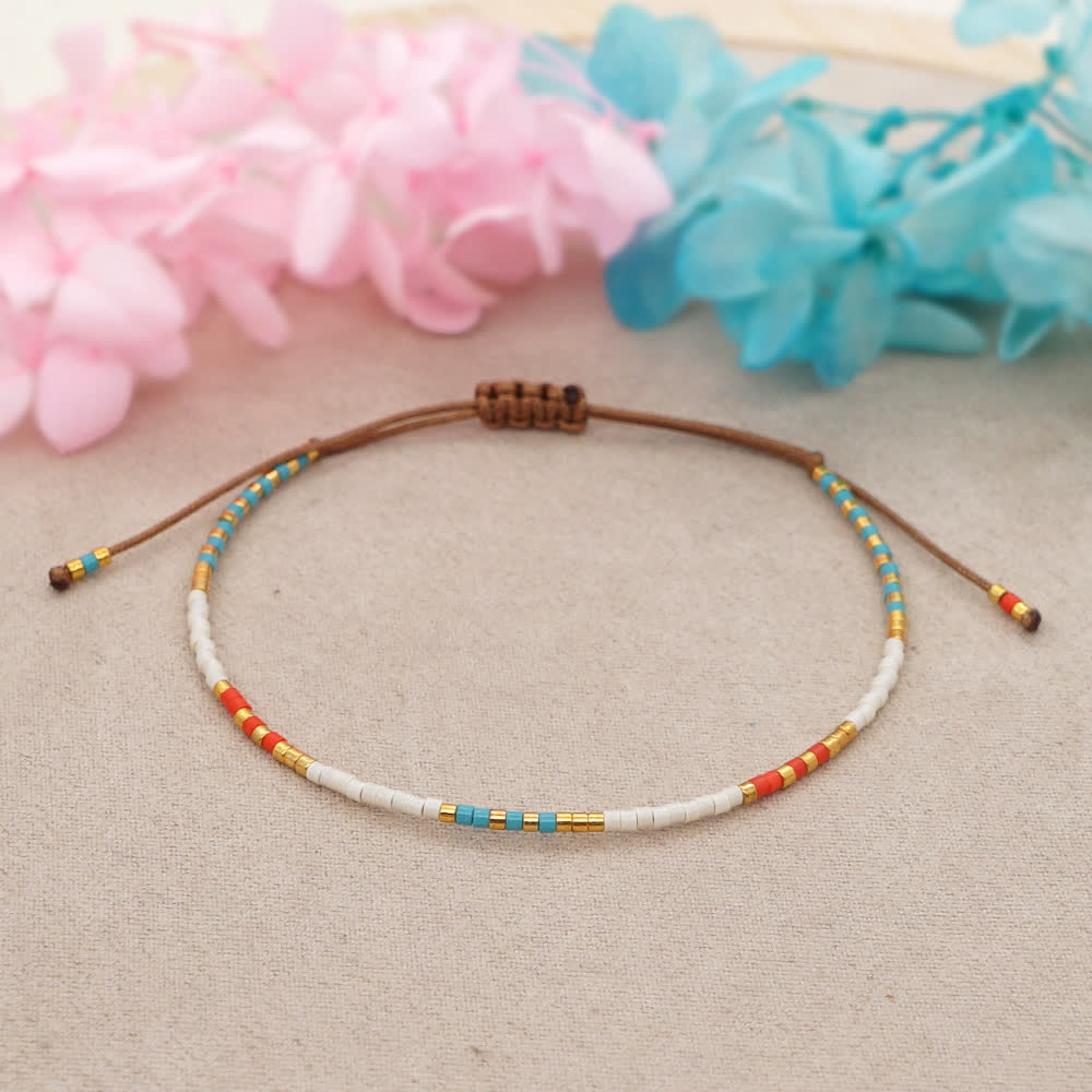 Bracelet tressé marron en perles de riz colorées Olivenorma