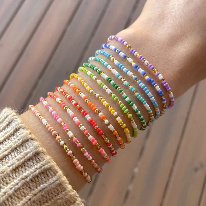 Ensemble de 12 bracelets en perles de riz colorées Olivenorma